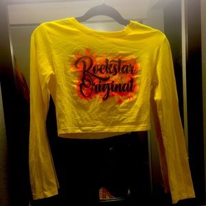 This yellow crop top is size:US(M) Brand:Rockstar Original